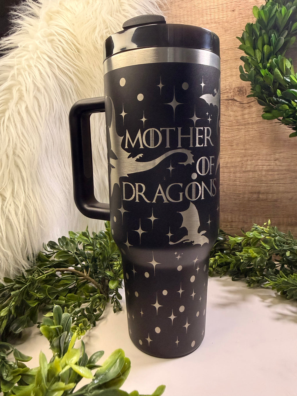 Black 40oz handled tumbler engraved with “Mother of Dragons” and dragon silhouettes