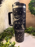 Black 40oz handled tumbler engraved with “Mother of Dragons” and dragon silhouettes