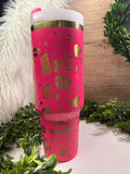 Pink tumbler with burn book, kiss lips, hearts, and mean girl quotes