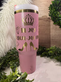 Pink tumbler with gold text "IN My Glam-ma era" and luxury designs 