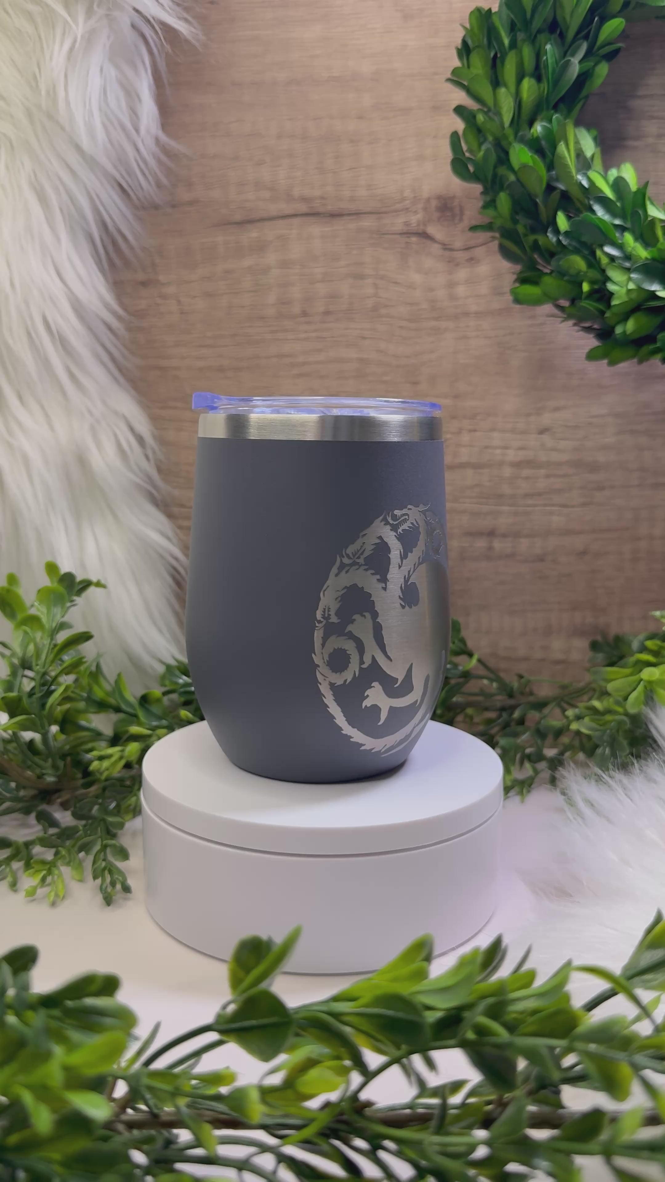 Dark gray wine tumbler engraved with “I Drink and I Know Things” quote