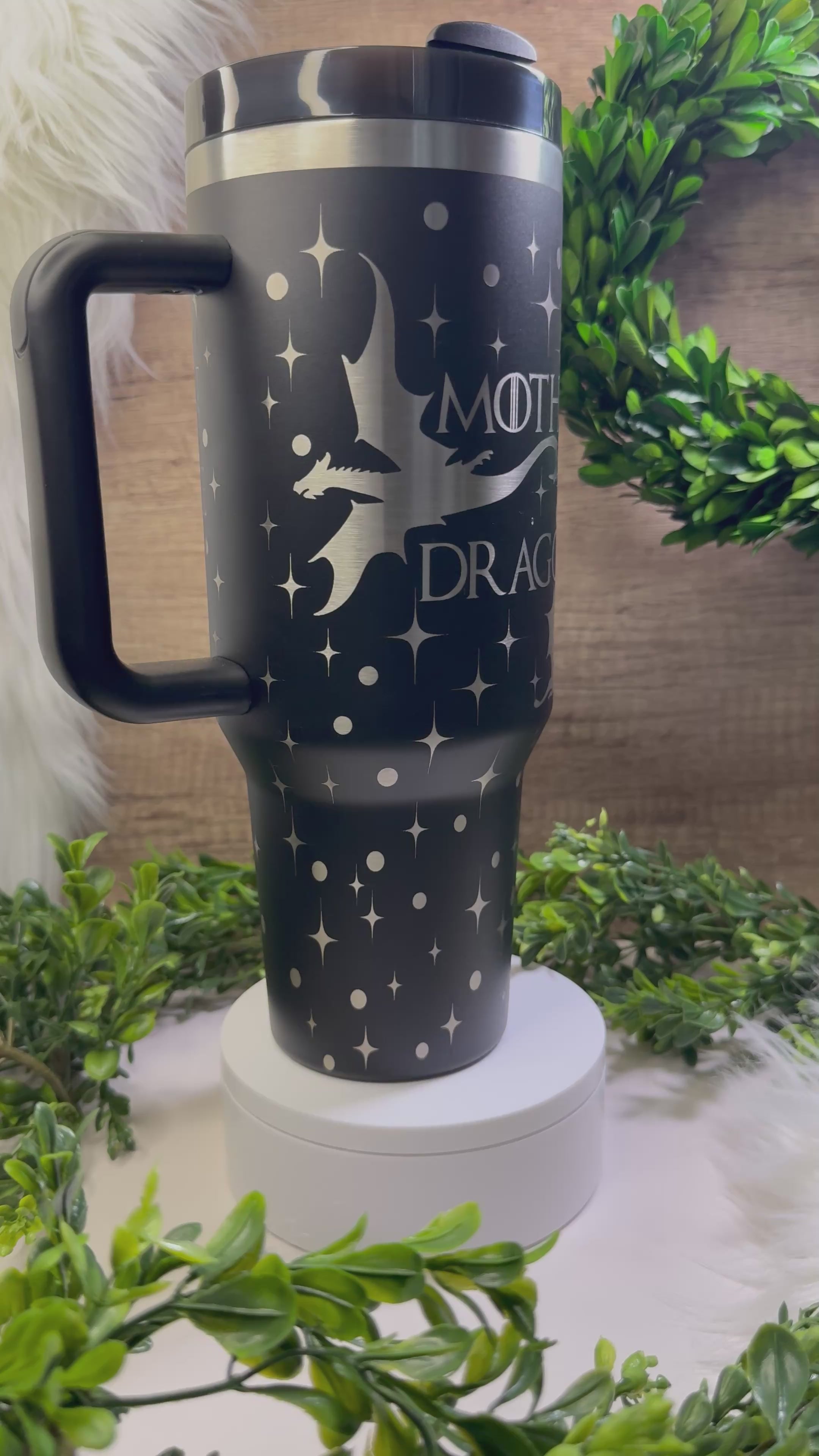 Black 40oz handled tumbler engraved with “Mother of Dragons” and dragon silhouettes